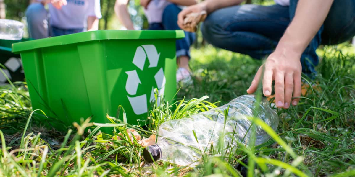 picking up and recycling bottles
